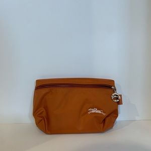 Longchamp orange cosmetic bag
